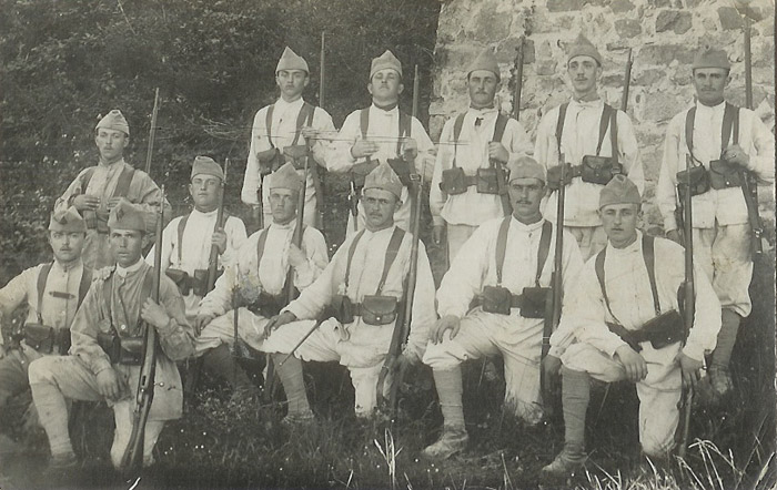 Troops outfitted in their fatigue uniforms which were only worn in the rear.