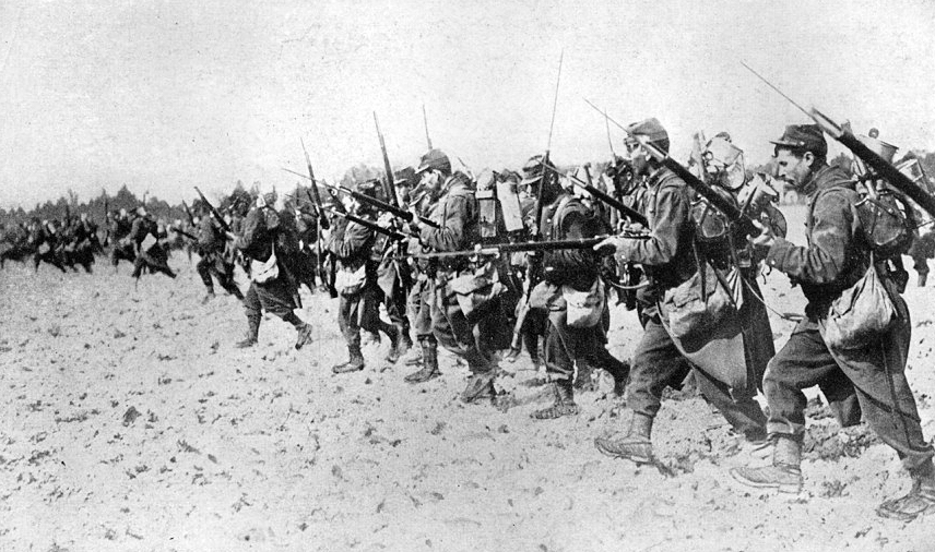 Likely a posed but dramatic action scene. Nonetheless, the image is effective in giving the viewer an idea of fighting in 1914.