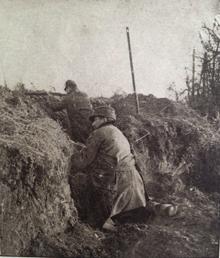 This photo gives a good idea of the early rudimentary trenches, which first appeared in the fall of 1914. 