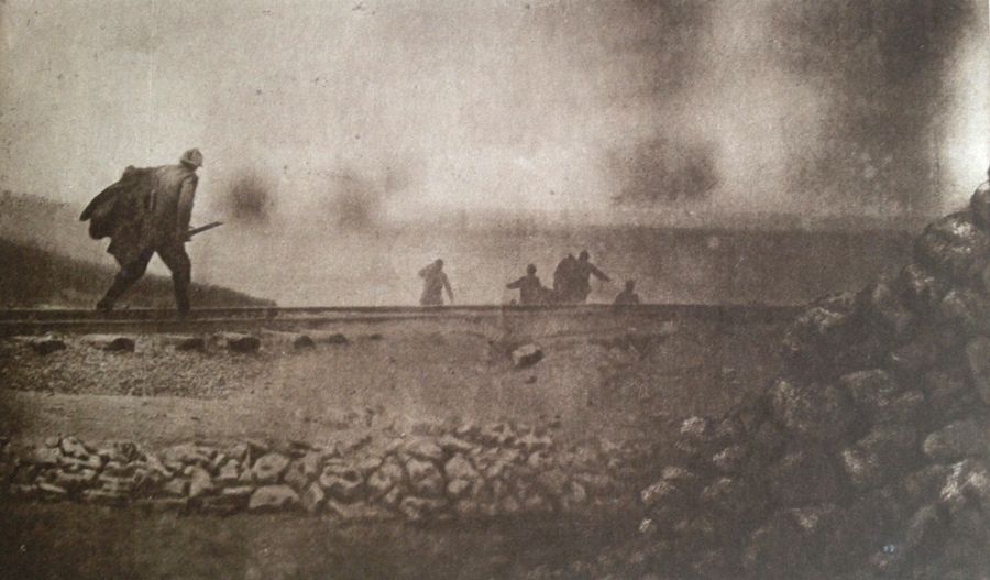 An incredible photo of a ration party bounding back up to the lines between salvoes of shells at Verdun in Sept. 1916.