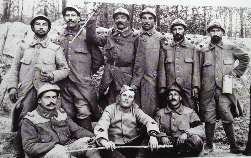These men are sporting the Adrian shoulder guards, which were produced in great numbers during spring and summer of 1916, before being taken out of service in the same year. This photo was likely taken in the fall or winter of 1915-16.