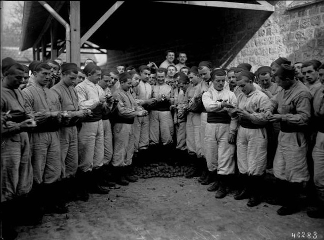 Class of 1917 recruits in training at Reuil. They wear the fatigue uniform of a zouave unit.