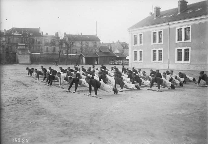 Class of 1917 recruits in training at Reuil. They wear the fatigue uniform of a zouave unit.
