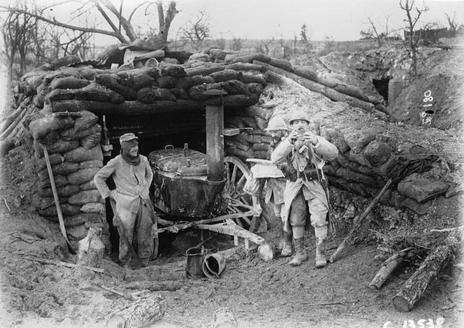 An entrenched rolling kitchen and its cooking crew.