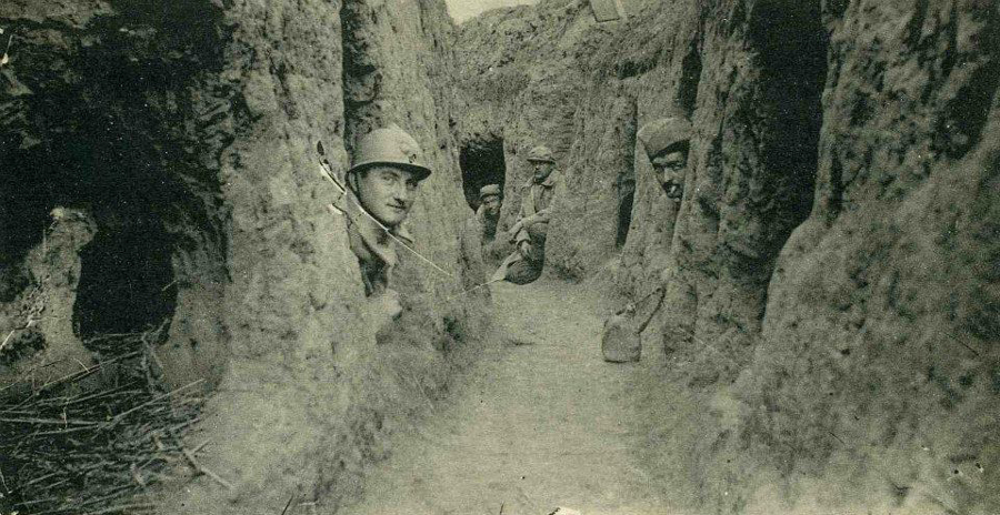 Soldiers in their small funk-hole shelters.