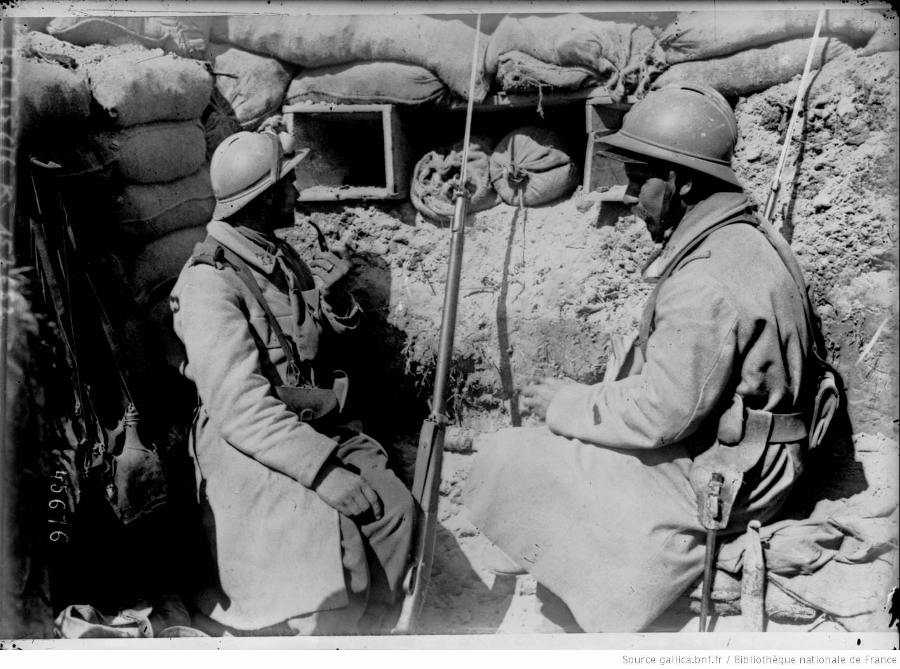 Two men sit at the listening post.