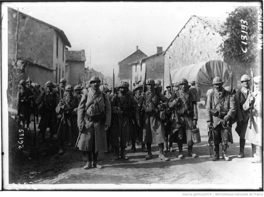 A chore party of the 64 RI pause for a photo, ca. summer or fall 1915. 