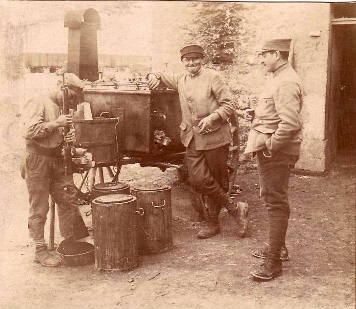 A cook uses a rifle butt to crush coffee beans