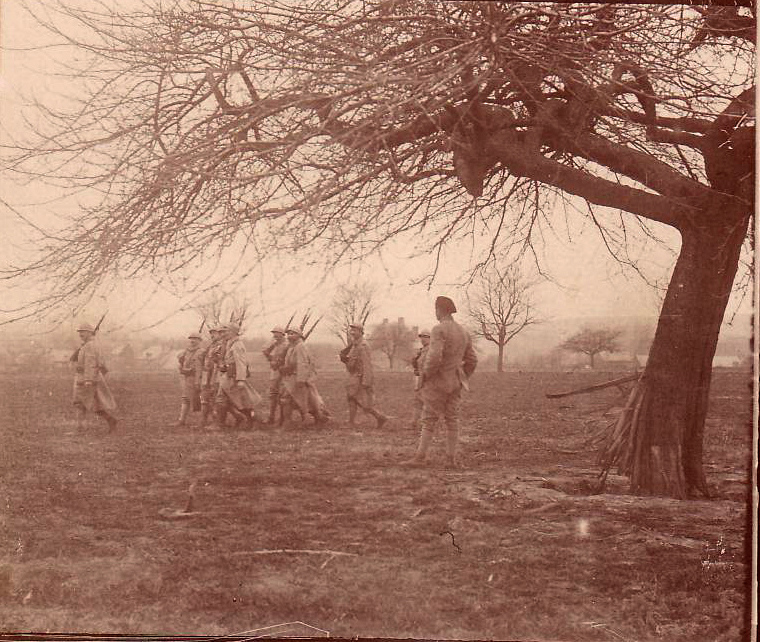 The timeless feature of soldier life: a NCO leads his squad in foot and arms drill.