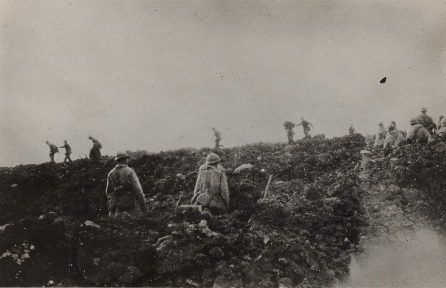 An incredible combat photo showing French hand grenadiers dashing forward and clearing the ground of enemy.