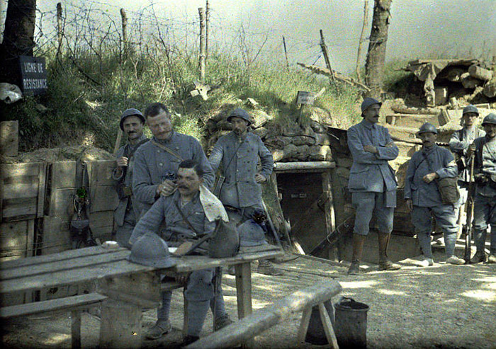 A Colonial soldier gets his haircut by the unit barber.