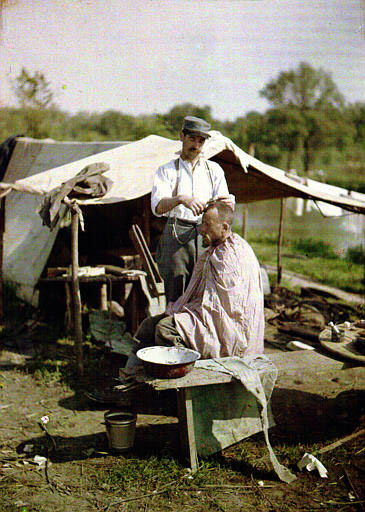 Another soldier getting a haircut.