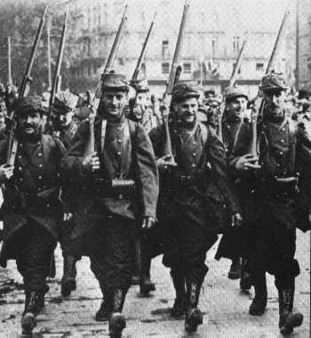 Soldiers marching through the streets of Paris on their way to the front, August 1914.