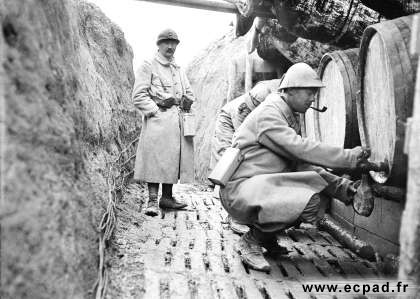 A soldier fills canteens at a water distribution depot in a support line trench near Navarin Farm (Chemin-des-Dames), 20 April 1916.