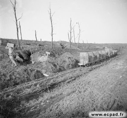 A wine ration arriving at Fort Douaumont by small-guage rail, 26 February 1917. From here the barrels will be rolled to a distribution depot.