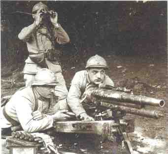 A crew operates a 37 mm canon.