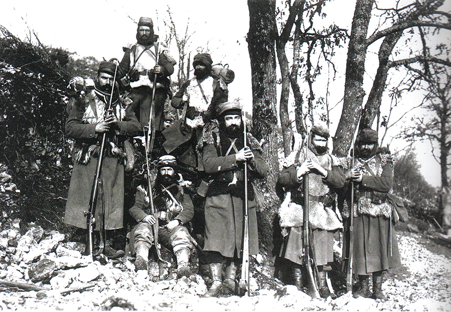 Infantrymen of the 23rd Co., 210th RI in the mountainous Vosges wearing large sheepskin jerkins to card against the frigid temperatures. (March 1915)