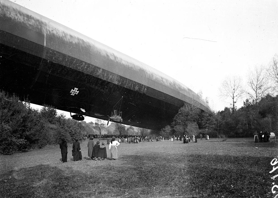 Curious civilians go to check out a downed zeppelin.