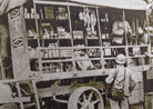 A truck-bazar offers small provisions for sale to troops in the support lines. 