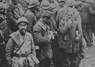 Fench first-aid post with German prisoners helping out. Saint Vaast Quarries, Verdun.