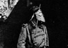 A sentinelle stands guard outside an entrance to Fort Vaux, Verdun.