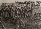 Cyclists and cavalrymen waiting to transmit orders in March 1918.