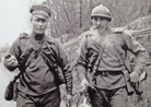 Two Russian soldiers of the Russian Legion. Photo taken by Frantz Adam, near Viller-Franqueux, March 1917.