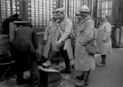 Soldiers on furlough in Paris, getting shoe shines.