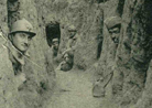 Soldiers in their small funk-hole shelters.