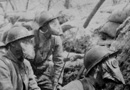 Men of the 48 RI donning M2 gas masks in the spring of 1916.