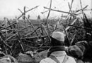 An eerie photo taken from French lines of German soldiers surrendering in 1915.