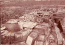 Old ammo crates have been used as revetment in this trench that also sports an armored observation turret. 