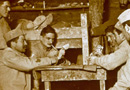 French troops playing cards in a bunker.