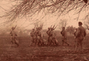 The timeless feature of soldier life: a NCO leads his squad in foot and arms drill.