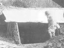 A Runner emerges from a wattled shelter near Verdun.