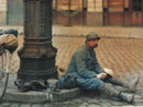 A bicyclist sits for a little rest.