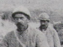 Cooks using mules to haul bread up to the front.