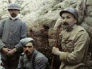 Soldiers and officers sitting outside a shelter, 1915.