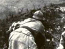 Soldiers duck as a shell impacts on the other side of an embankment, Verdun, 1916. (Note: this was actually from a filming done in the 1920s)