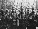 Soldiers marching through the streets of Paris on their way to the front, August 1914.