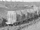 A wine ration arriving at Fort Douaumont by small-guage rail, 26 February 1917. From here the barrels will be rolled to a distribution depot.