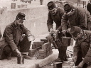 Territorials prepare meal in the streets of Paris, August 1914.