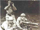 A crew operates a 37 mm canon.