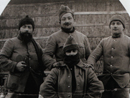 A group of men wearing cold weather gear.