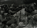 Soldiers of the 367th RI wearing assault rolls preparing to go into the attack at Orfeuil (Champagne) Oct. 1918. Note the man at center left carrying an ARS mask with a M2 as reserve. 