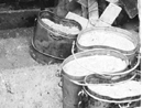 A musician prepares the meal in Boutheons.