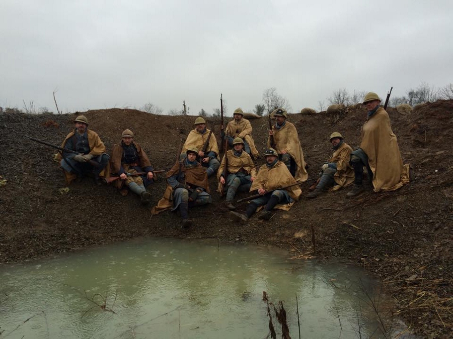 Members of the 18e RI and 151e RI in a shell-hole, December 1914.