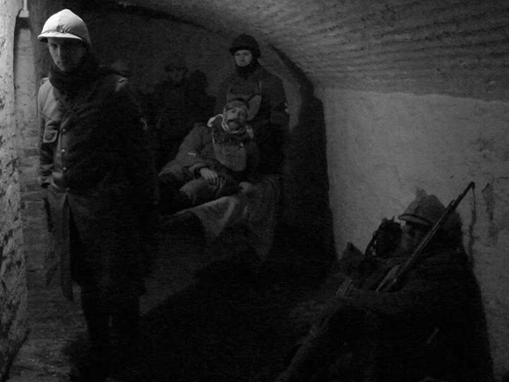 Brancardiers carry a wounded victim to the first-aid post, Fort Mifflin, March 2015.