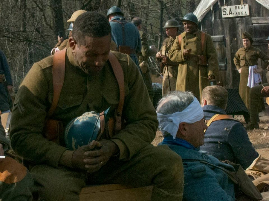 A member of the 372nd IR US awaits to be evacuated at the casualty clearing station, November 2014