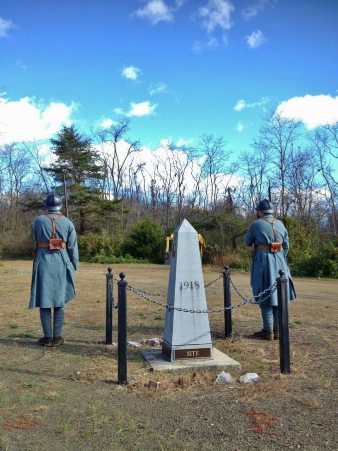 Sdts. Riton and Dujardin present arms in a ceremony to mark the start of the war 100 years ago, November 2014